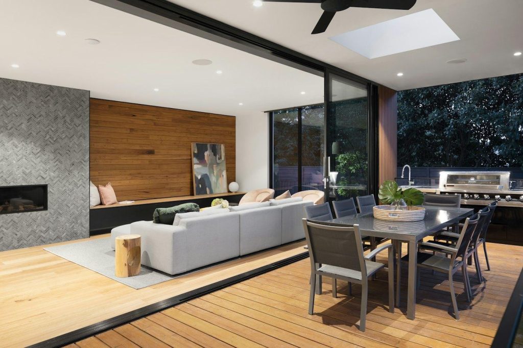 Wood deck opening to a living room